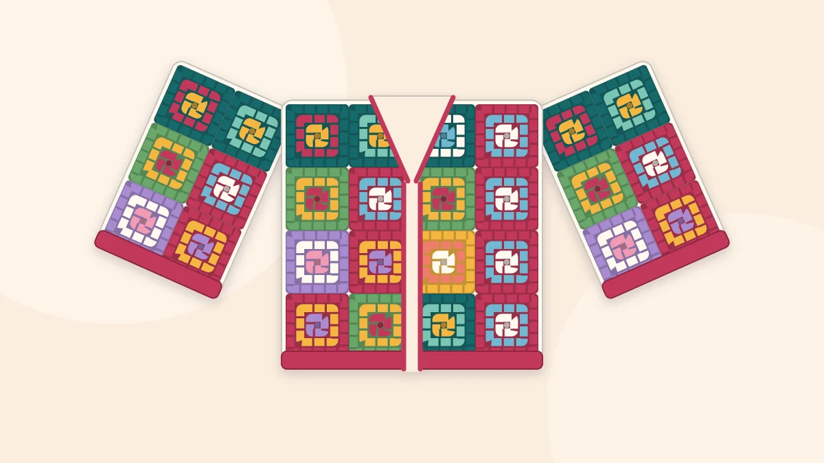 An open-front cardigan made of colorful granny squares, shown flat with the sleeves spread out